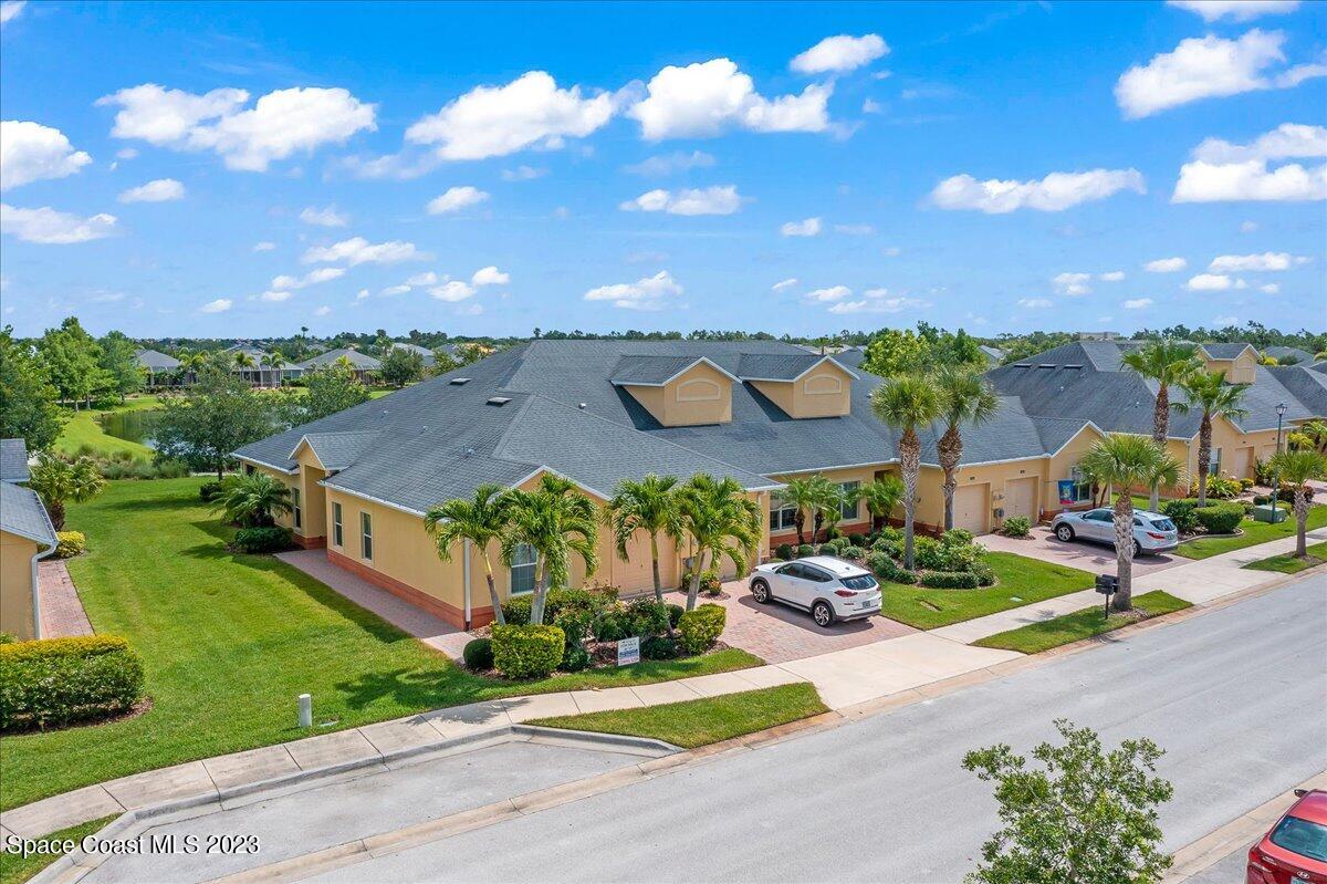 3680 Funston Circle Melbourne, FL 32940 - Photo 31 of 48 a aerial view of a house with a garden and outdoor space