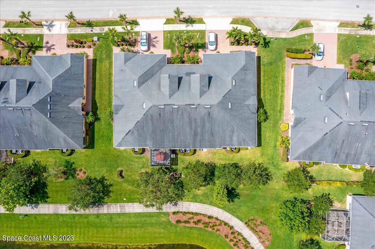 3680 Funston Circle Melbourne, FL 32940 - Photo 32 of 48 an aerial view of houses with yard