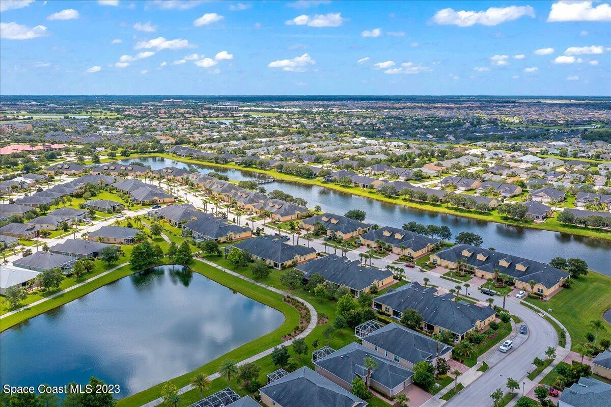 3680 Funston Circle Melbourne, FL 32940 - Photo 36 of 48 an aerial view of residential building and lake