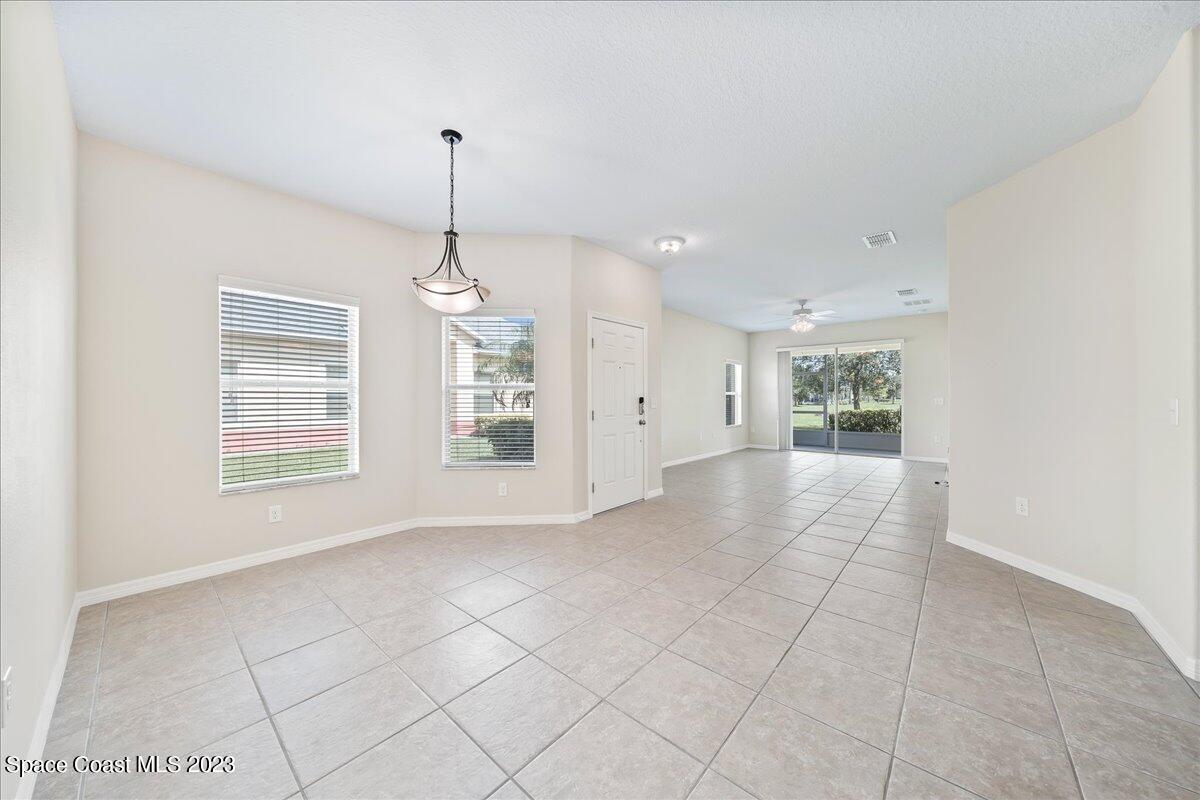 3680 Funston Circle Melbourne, FL 32940 - Photo 6 of 48 a view of an empty room with a window