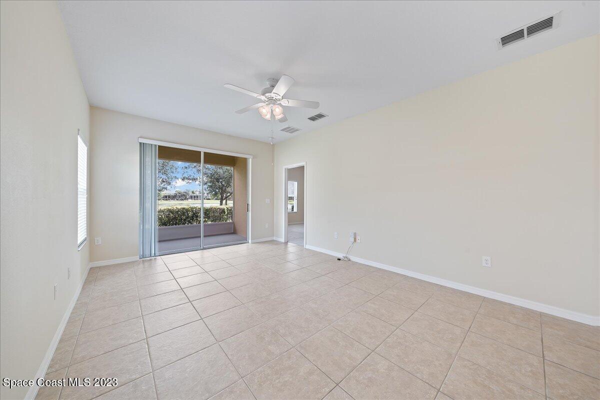 3680 Funston Circle Melbourne, FL 32940 - Photo 9 of 48 a view of an empty room with a window