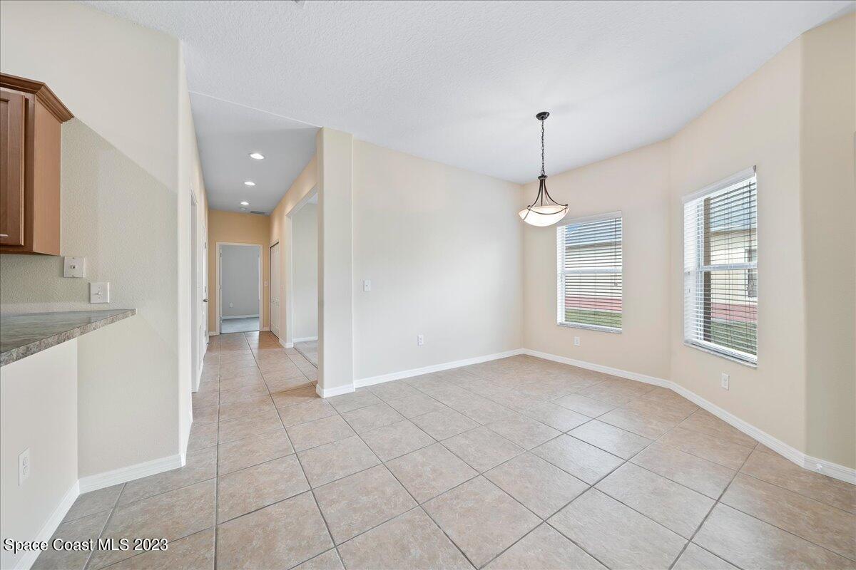 3680 Funston Circle Melbourne, FL 32940 - Photo 10 of 48 a view of an empty room with a window