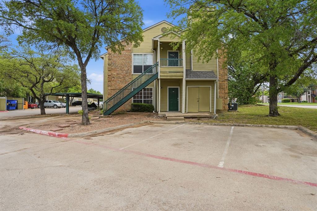 4101 Esters Road, Unit 101 Irving, TX 75038 - Photo 2 of 24 Well-maintained community with mature landscaping