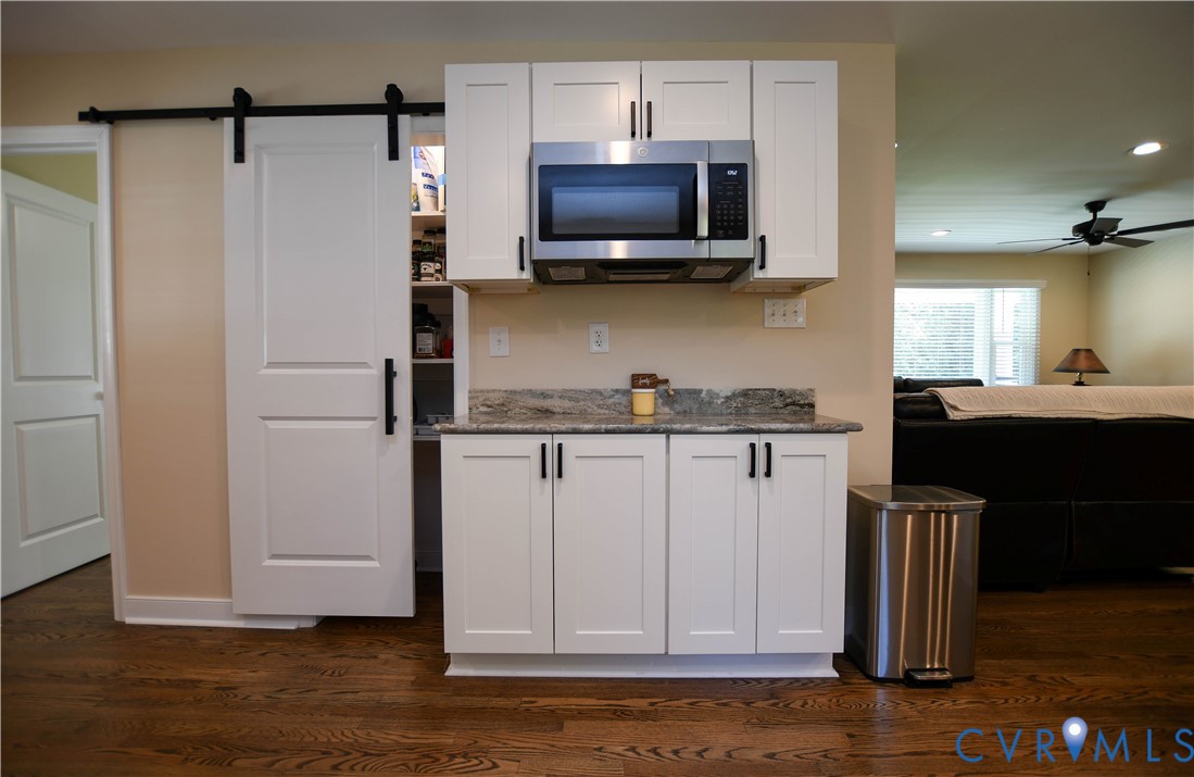 1448 Canterbury Road St. Stephens Church, VA 23148 - Photo 13 of 57 Kitchen featuring white cabinetry, a stainless ste