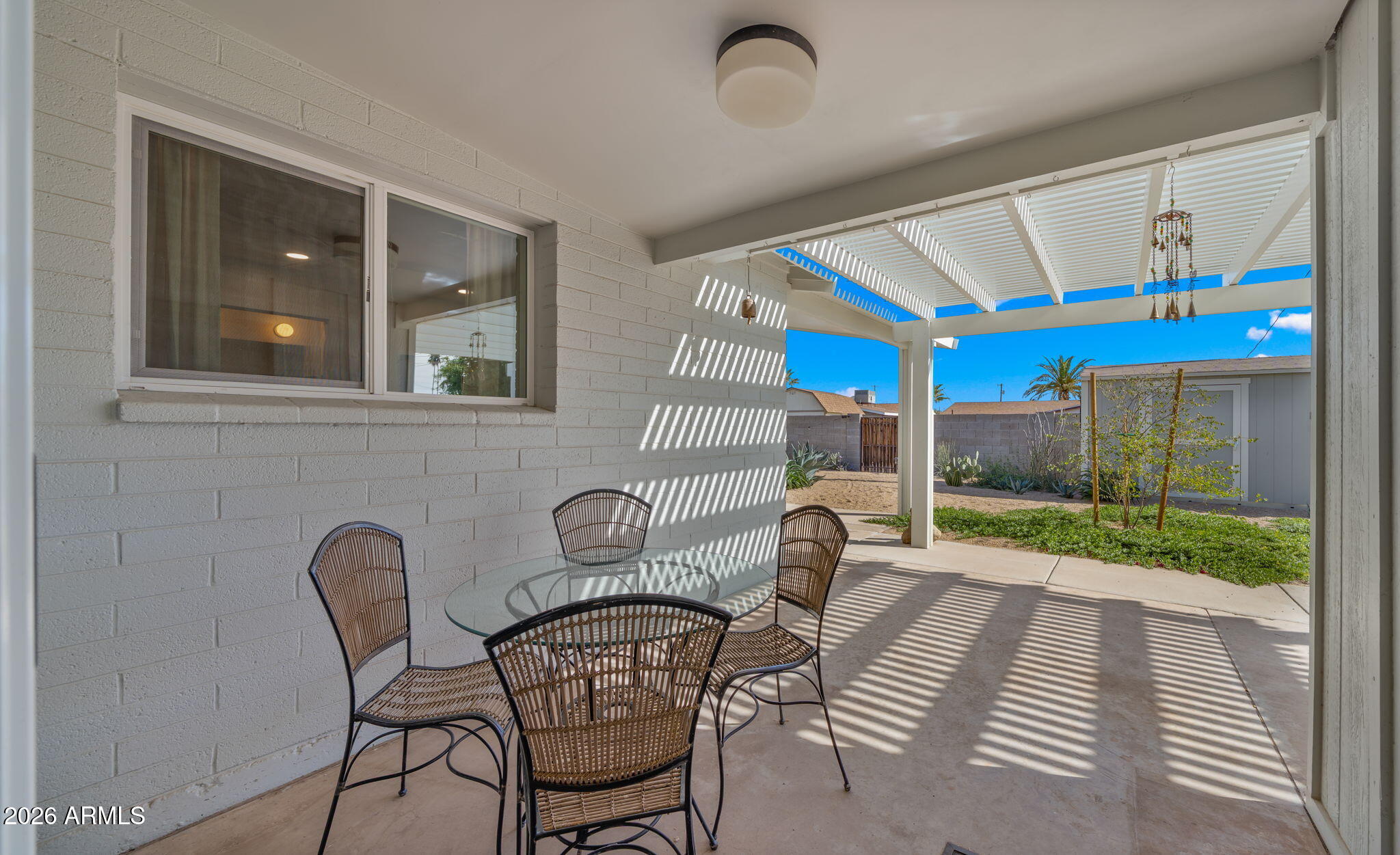 2115 North Normal Avenue Tempe, AZ 85288 - Photo 35 of 38 a view of a patio with a table and chairs