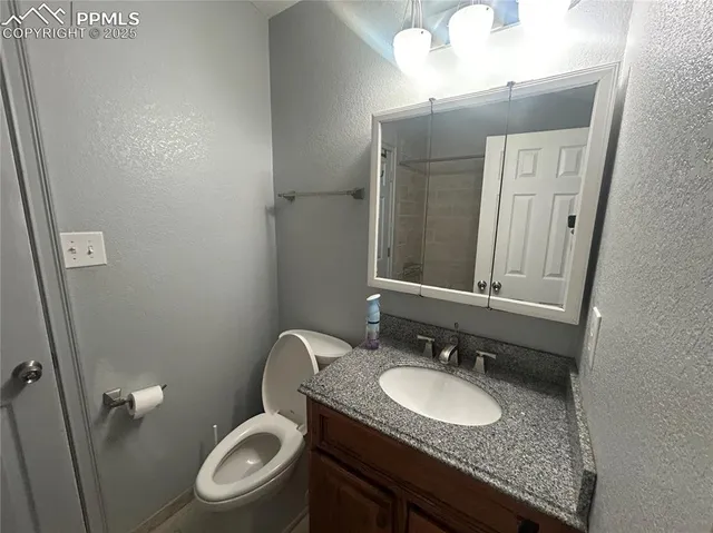 a bathroom with a shower and a bath tub