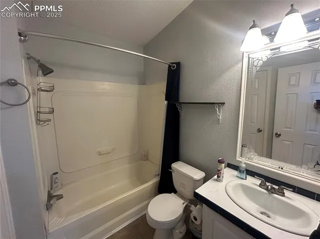 a hallway with washer and dryer