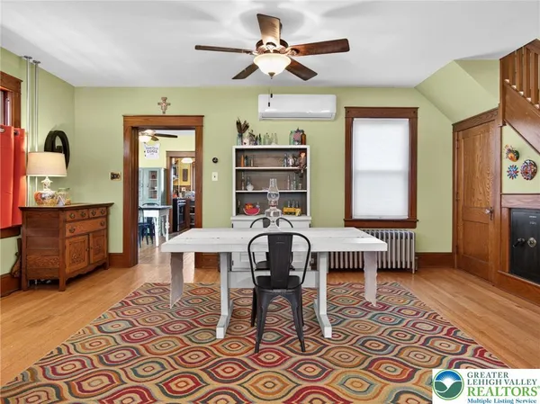 a room with furniture and wooden floor
