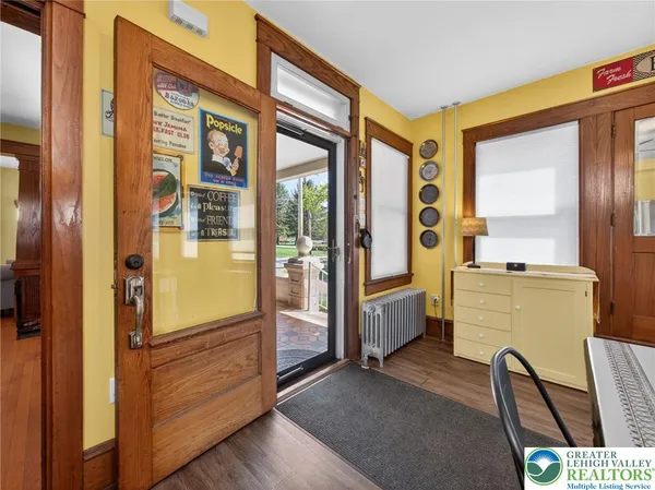 a kitchen with stainless steel appliances granite countertop a stove and a microwave