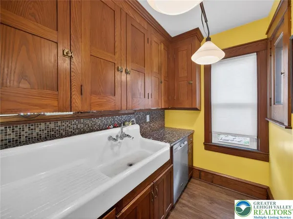 a bathroom with a toilet and a sink