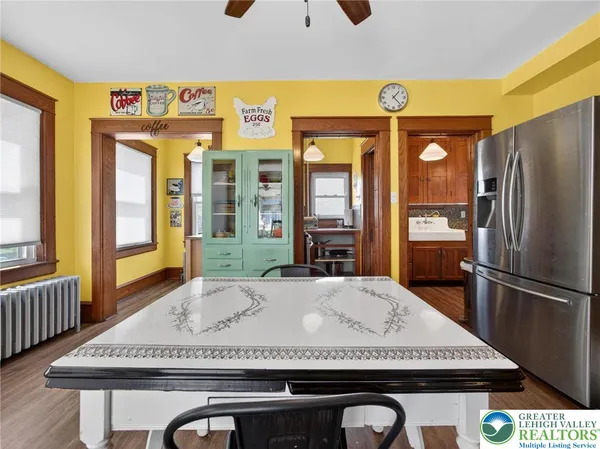a view of entryway with wooden floor