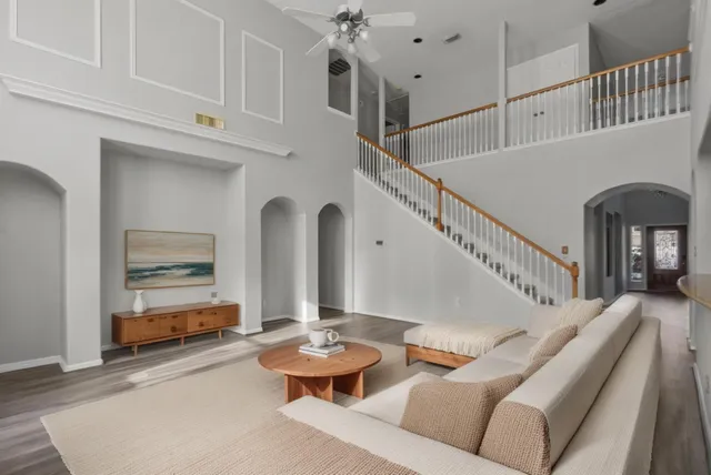 a view of hall way with furniture