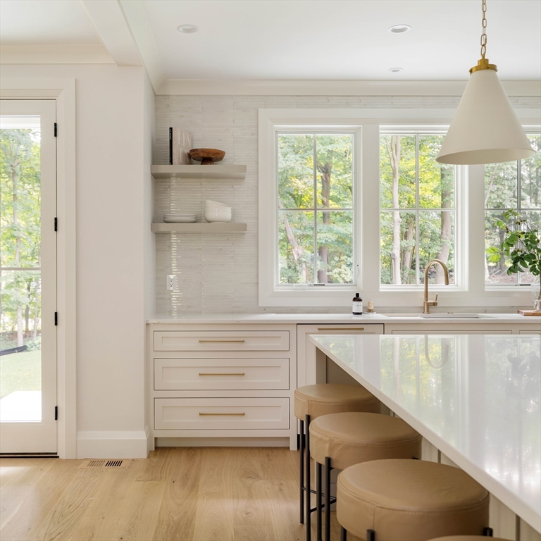14 Bird Hill Avenue Wellesley, MA 02481 - Photo 11 of 37 a kitchen with a window a sink and a cabinets