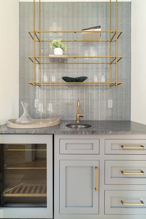 14 Bird Hill Avenue Wellesley, MA 02481 - Photo 14 of 37 a stove top oven sitting inside of a kitchen