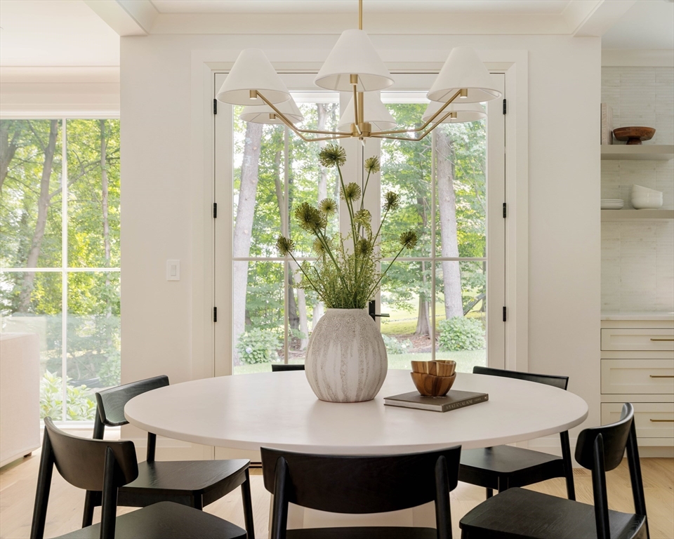 14 Bird Hill Avenue Wellesley, MA 02481 - Photo 16 of 37 a view of a dining room with furniture window and outside view