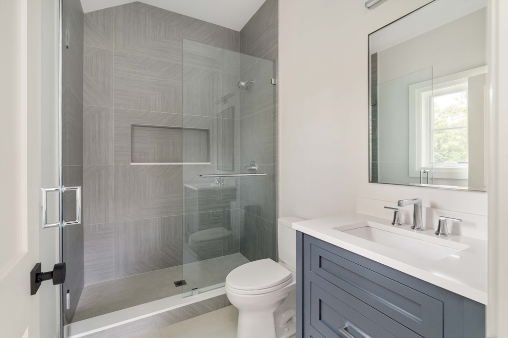 14 Bird Hill Avenue Wellesley, MA 02481 - Photo 32 of 37 a bathroom with a sink toilet and shower