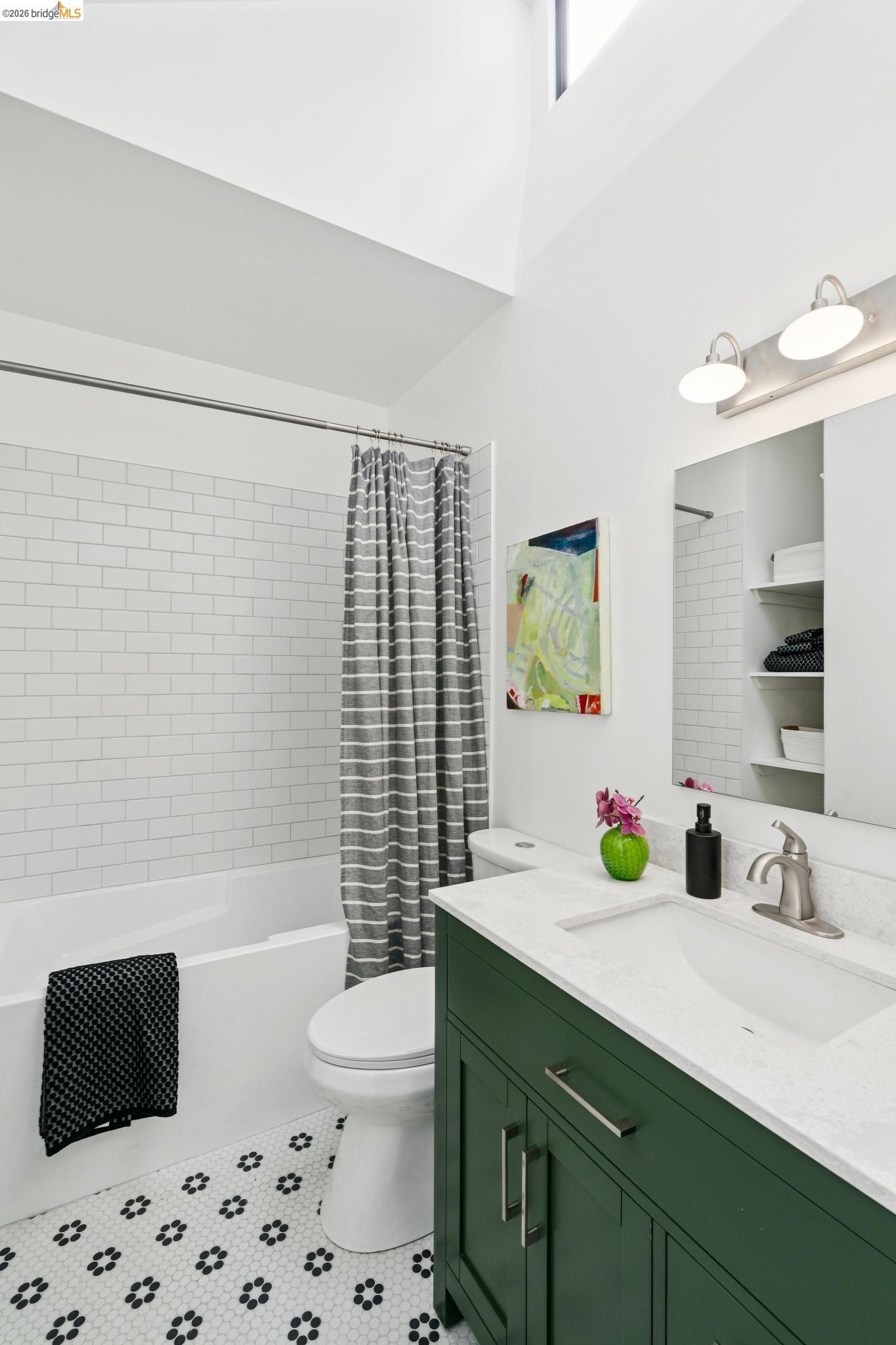 2320 Derby Street Berkeley, CA 94705 - Photo 18 of 39 a bathroom with a sink a toilet and shower