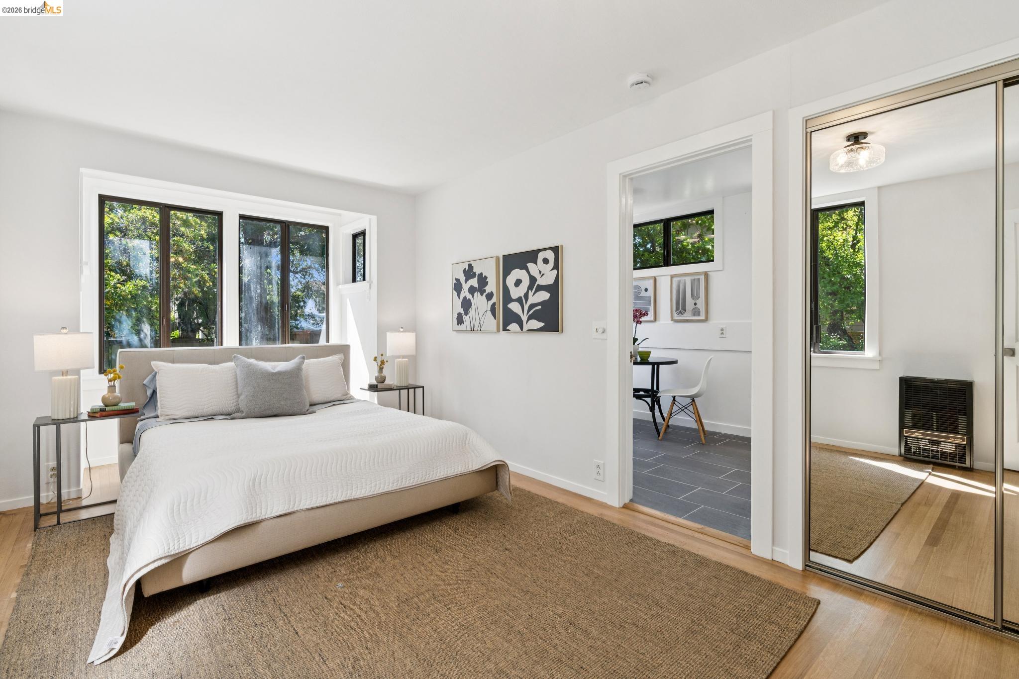 2320 Derby Street Berkeley, CA 94705 - Photo 19 of 39 a bedroom with a large bed and a couch
