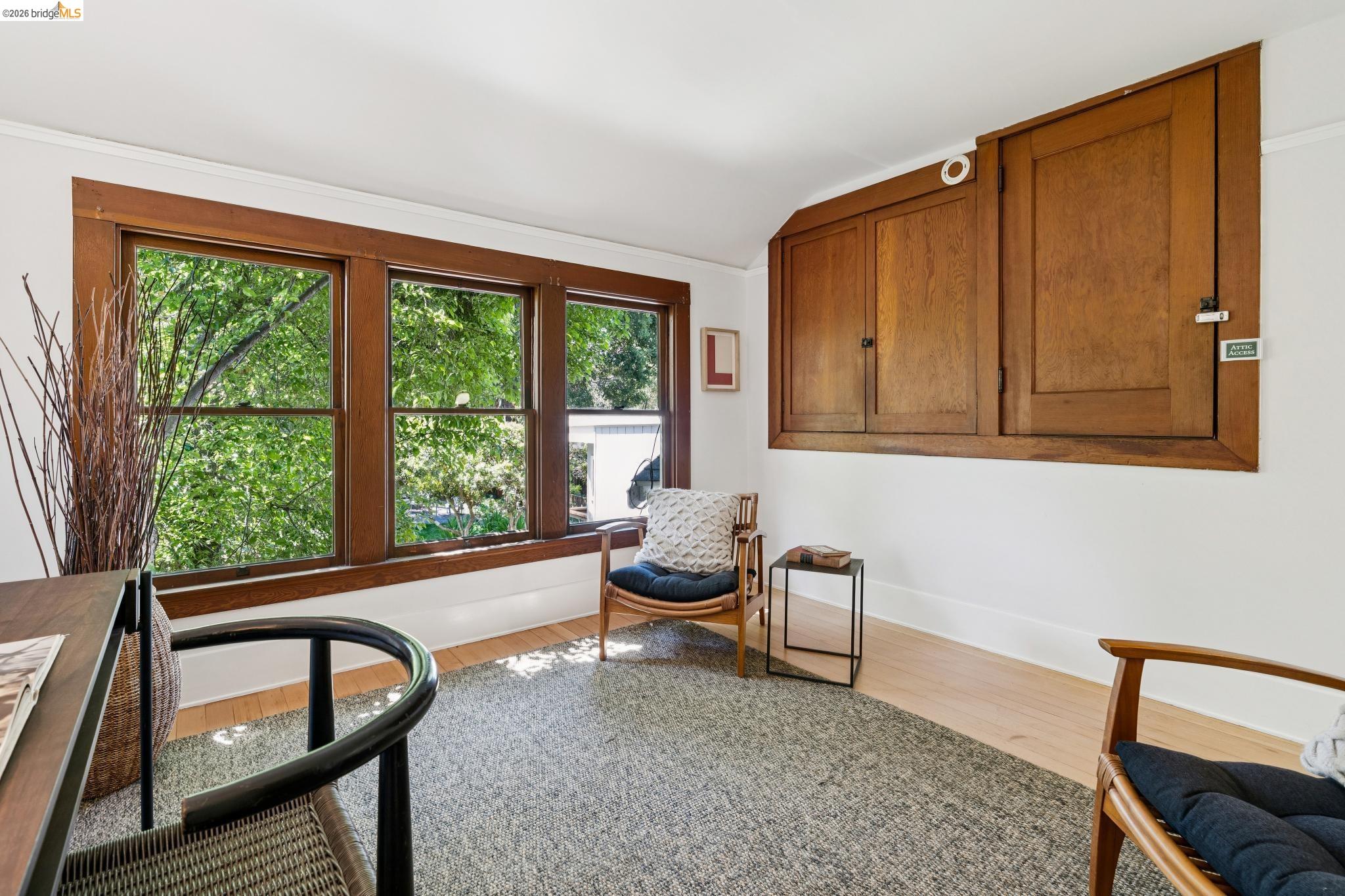 2320 Derby Street Berkeley, CA 94705 - Photo 24 of 39 a living room with furniture and a window