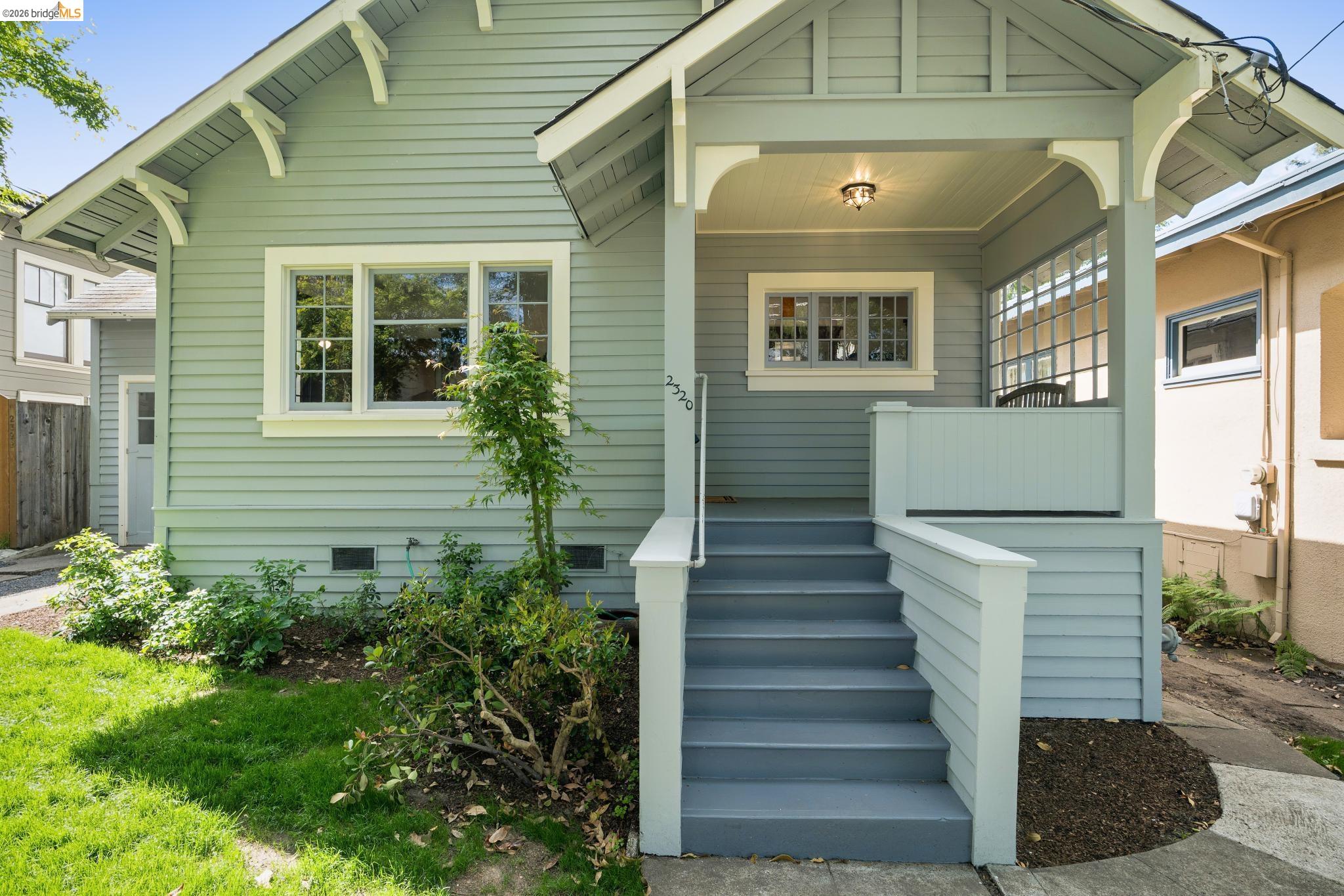 2320 Derby Street Berkeley, CA 94705 - Photo 3 of 39 a view of a brick house with many windows