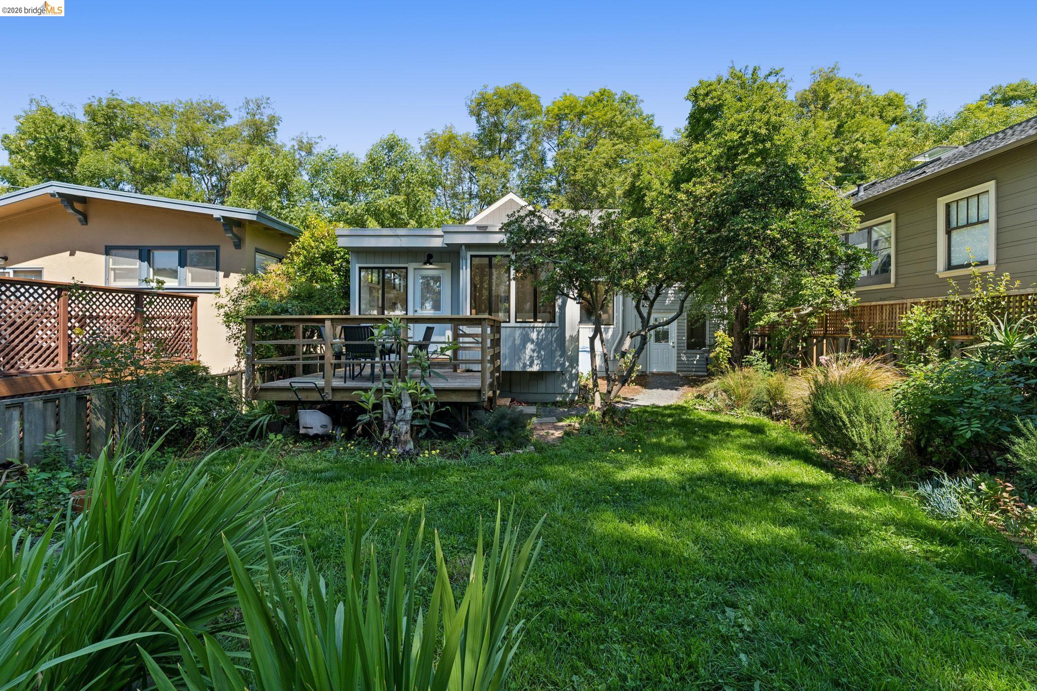 2320 Derby Street Berkeley, CA 94705 - Photo 33 of 39 a view of a house with a backyard and sitting area