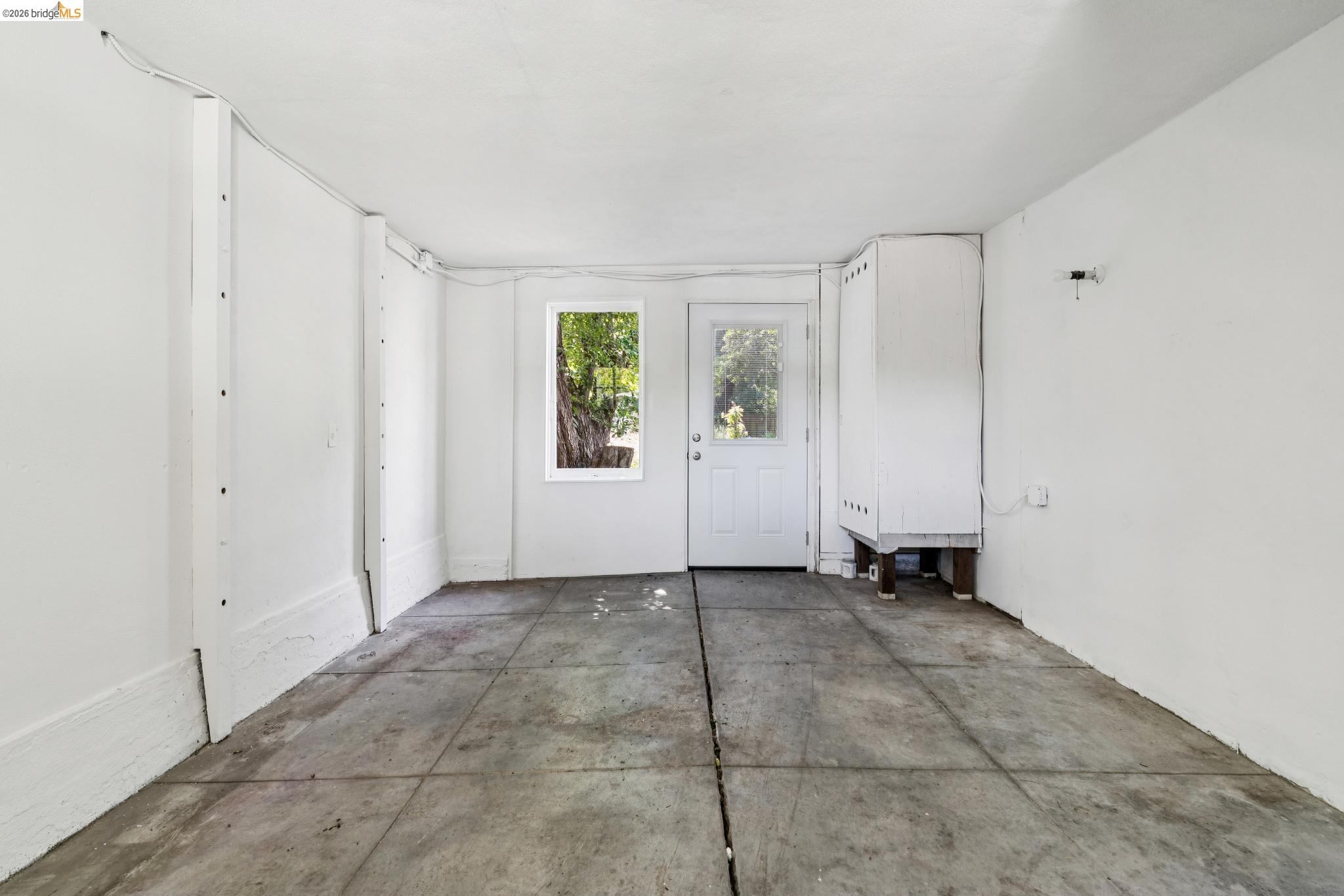2320 Derby Street Berkeley, CA 94705 - Photo 37 of 39 a view of an empty room with a window