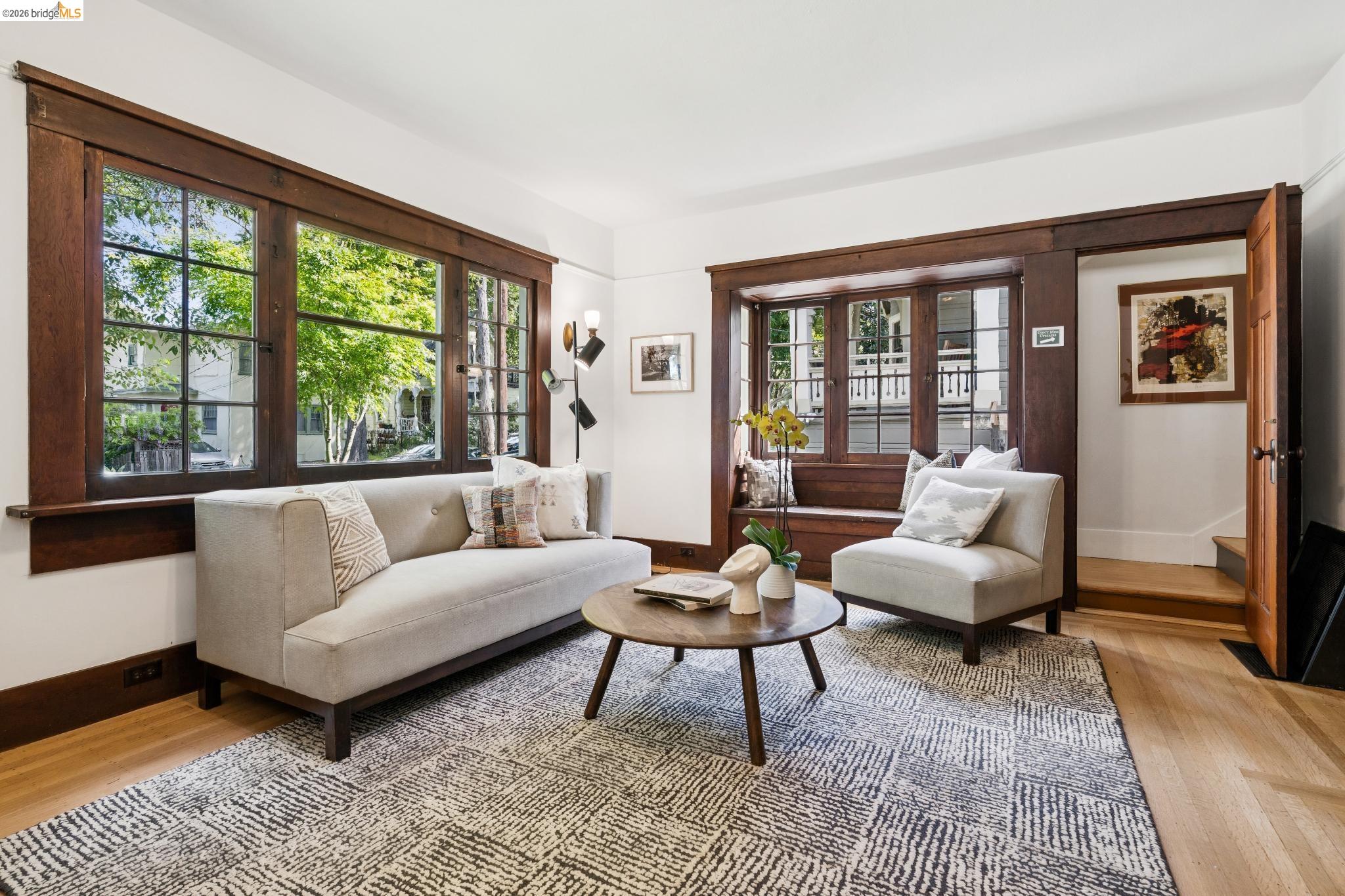 2320 Derby Street Berkeley, CA 94705 - Photo 6 of 39 a living room with furniture and a large window