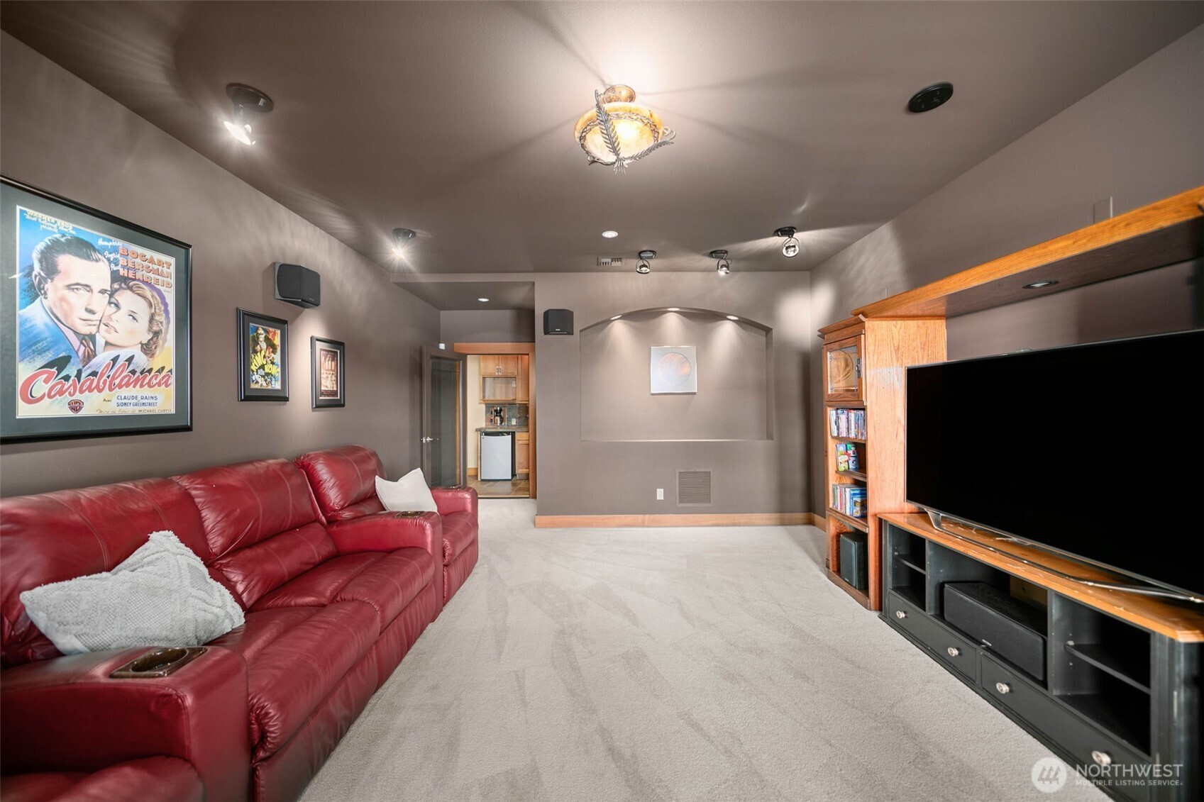 232 Crystal Drive Chelan, WA 98816 - Photo 29 of 39 a living room with furniture and a flat screen tv