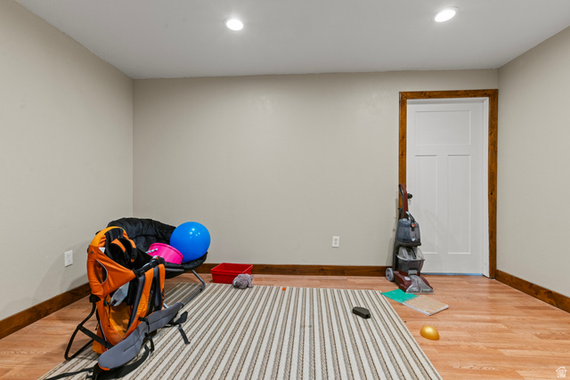 4557 North Ranch Road East Tooele, UT 84074 - Photo 25 of 43 Recessed lighting, light-toned wall finishes, and wood-finish flooring with wood trim. Can also be a storage room.