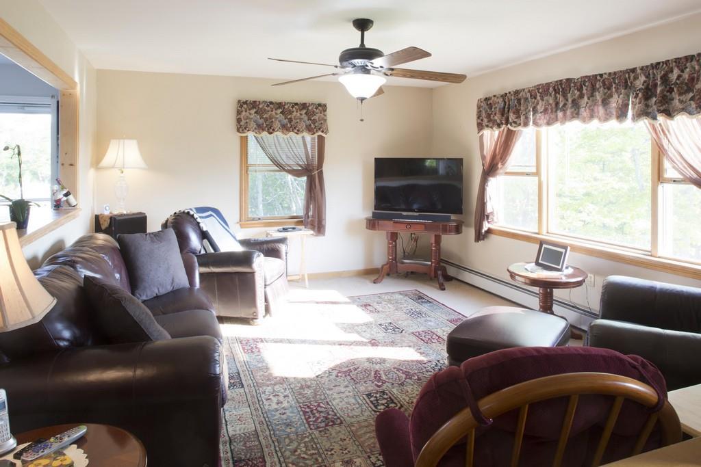 26 Emerson Mill Road Hampden, ME 04444 - Photo 15 of 34 Living room with sunset views