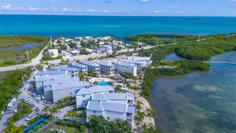 a view of a city with an ocean