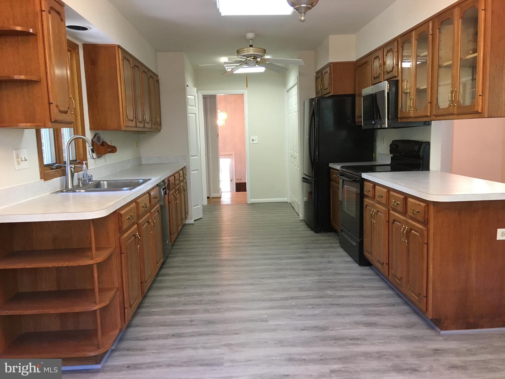 7020 Redmiles Road Laurel, MD 20707 - Photo 11 of 19 Spacious Kitchen with Huge Pantry and Laundry