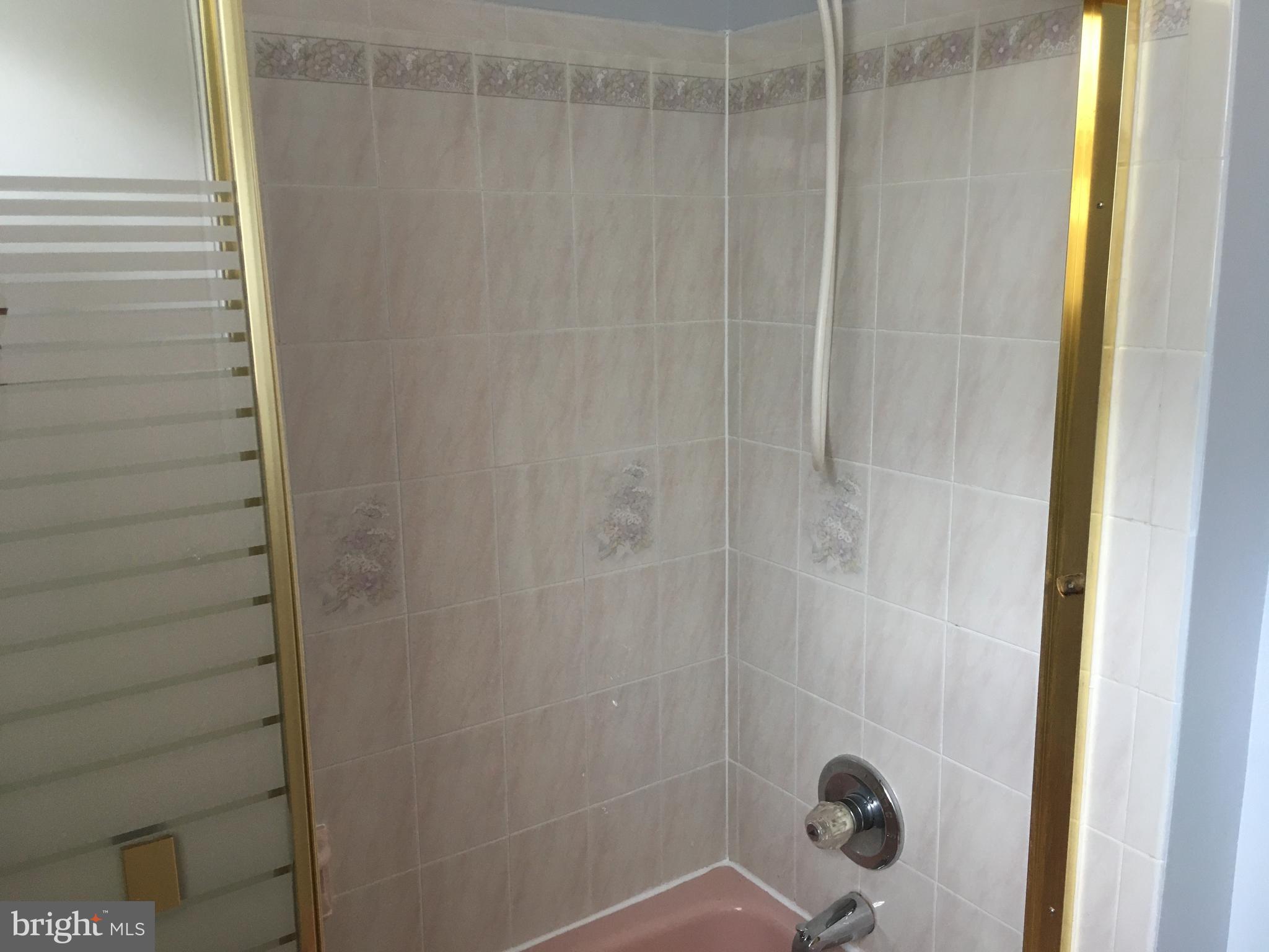 7020 Redmiles Road Laurel, MD 20707 - Photo 19 of 19 Basement Bathroom with Designer Tile