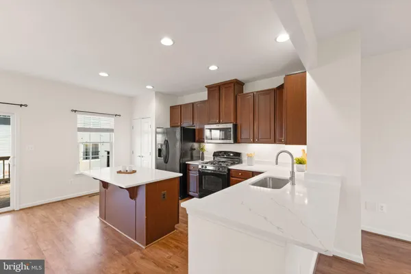 a view of a balcony with wooden floor