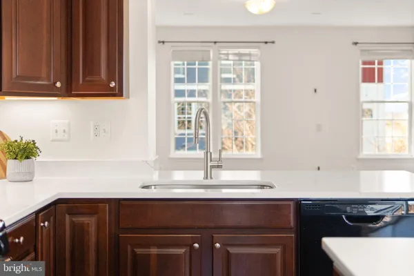 a bathroom with a shower and a glass door