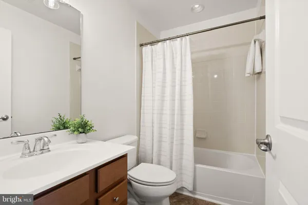 a aerial view of a house with swimming pool outdoor seating