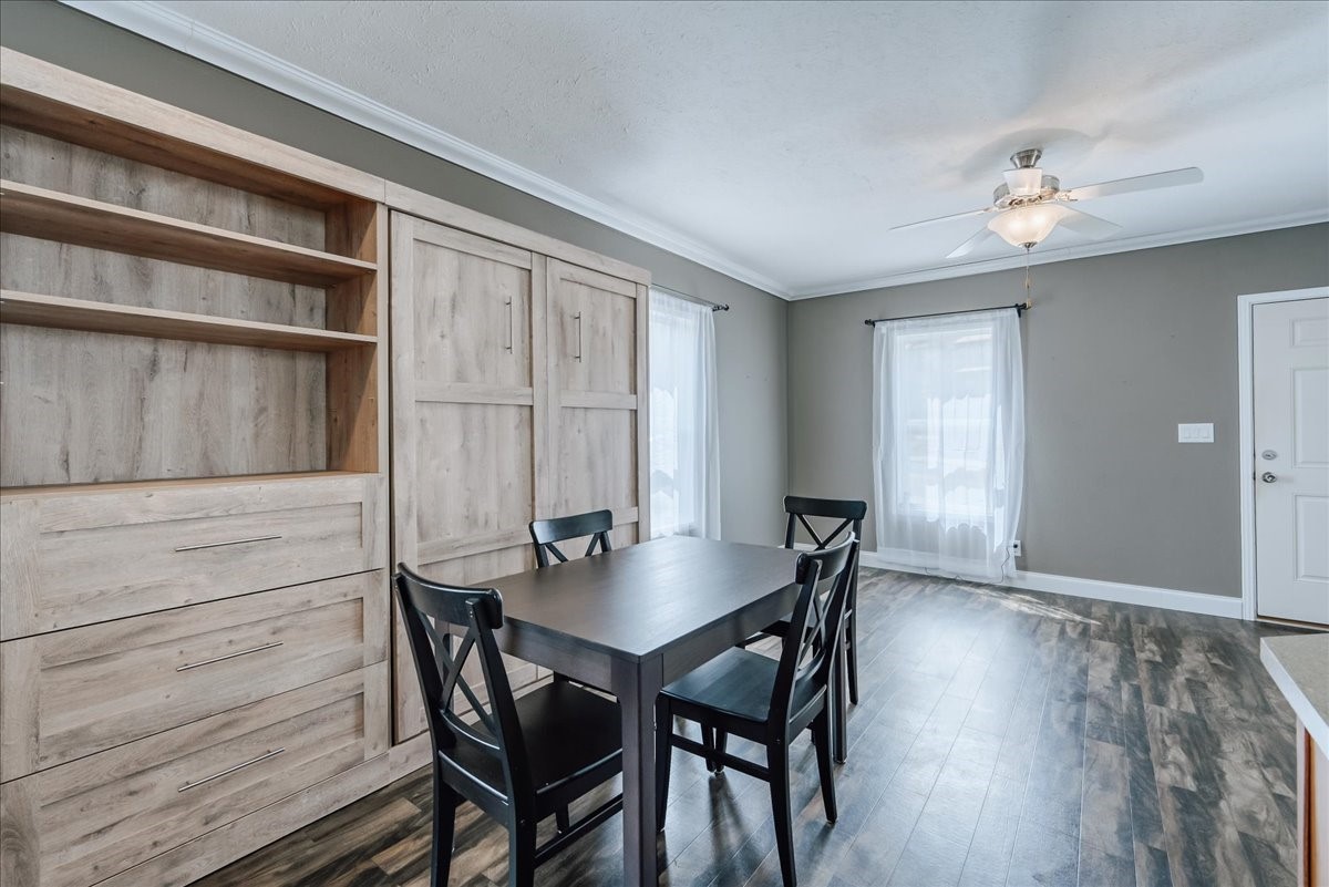 847 Airport Road, Unit 21 Breckenridge, CO 80424 - Photo 13 of 35 a view of a dining room with furniture and wooden floor