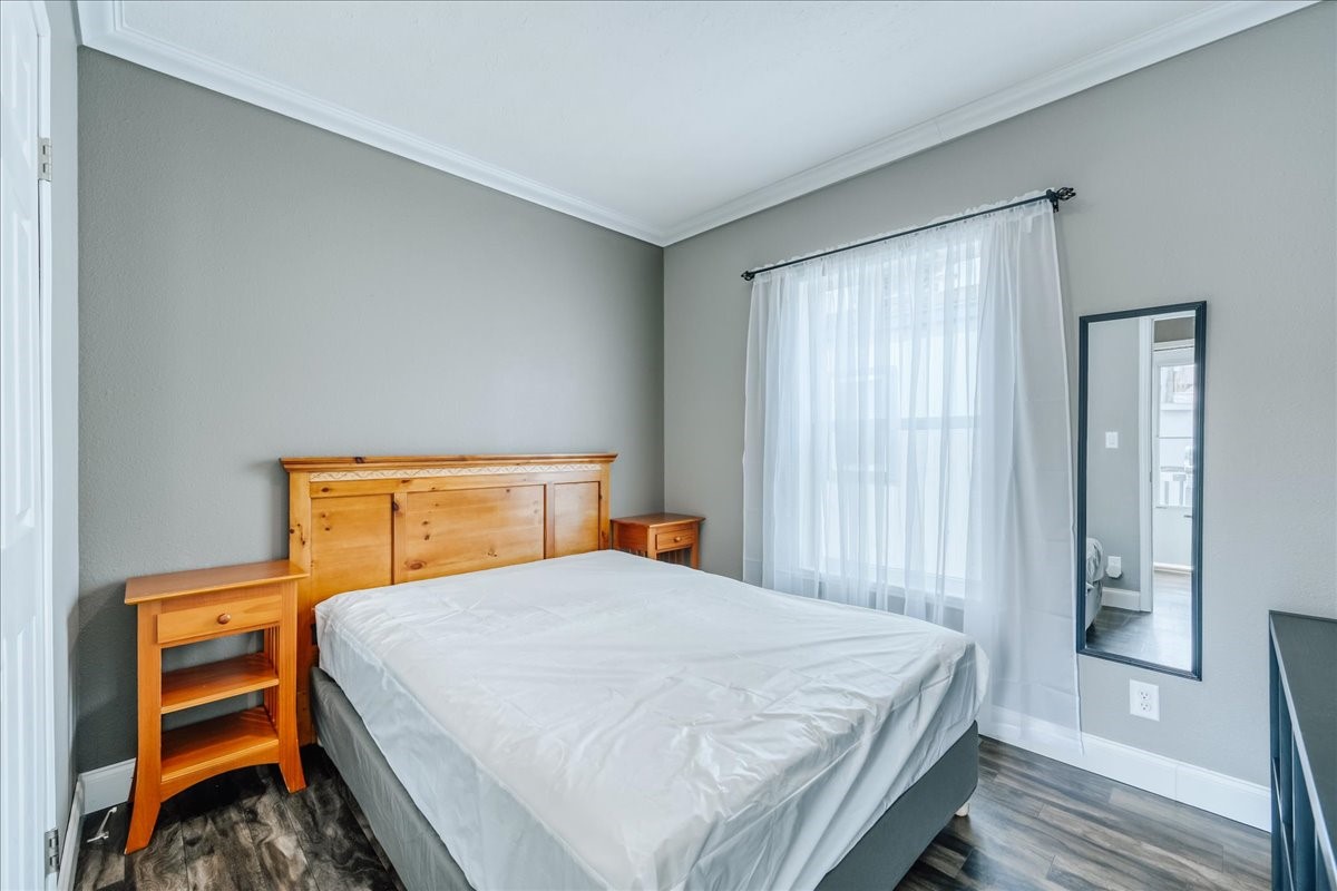 847 Airport Road, Unit 21 Breckenridge, CO 80424 - Photo 19 of 35 a bedroom with a bed and a window