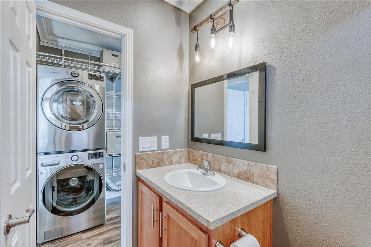 847 Airport Road, Unit 21 Breckenridge, CO 80424 - Photo 20 of 35 a bathroom with a sink a washer and dryer