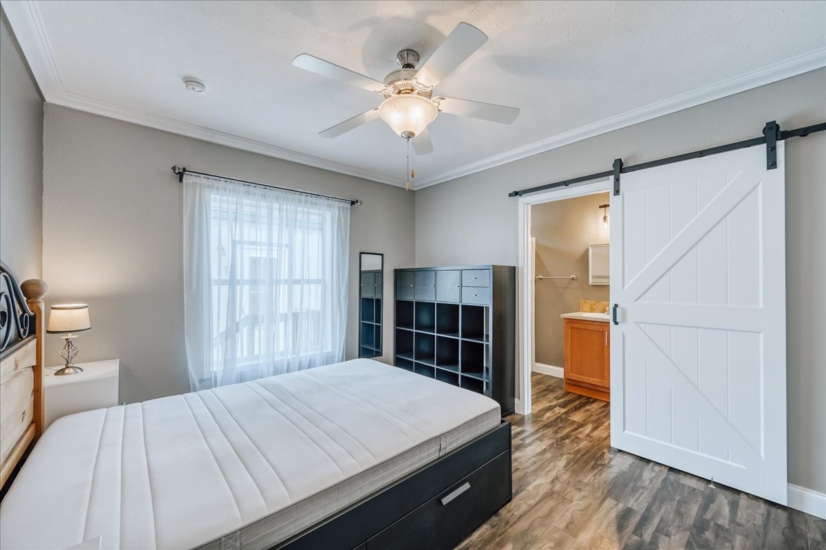 847 Airport Road, Unit 21 Breckenridge, CO 80424 - Photo 21 of 35 a bed room with a bed and a view of kitchen