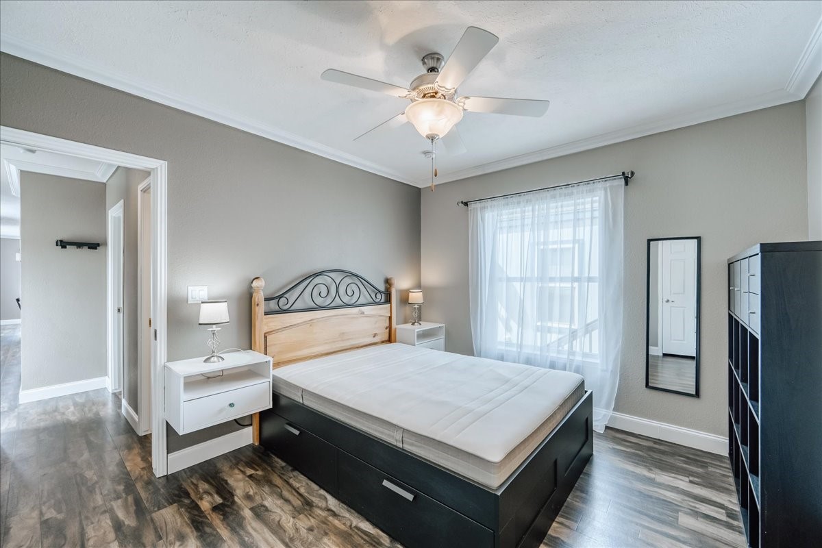 847 Airport Road, Unit 21 Breckenridge, CO 80424 - Photo 22 of 35 a bedroom with a bed and a chandelier
