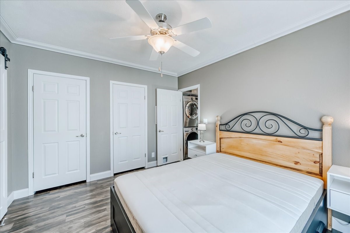 847 Airport Road, Unit 21 Breckenridge, CO 80424 - Photo 23 of 35 a bedroom with a bed and a ceiling fan