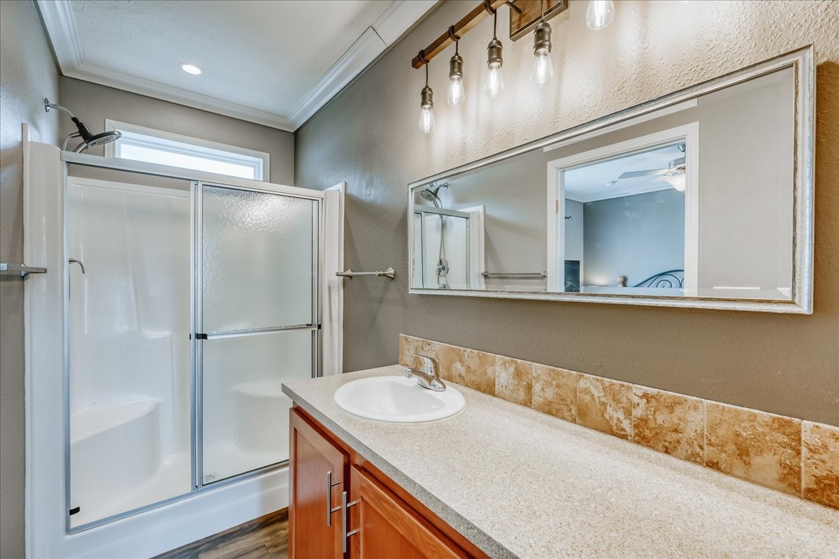 847 Airport Road, Unit 21 Breckenridge, CO 80424 - Photo 25 of 35 a bathroom with a sink a mirror and a shower