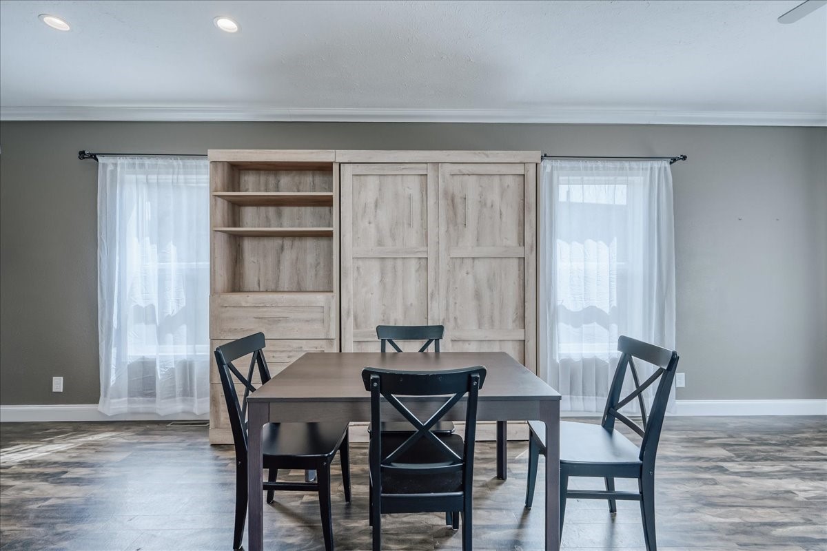 847 Airport Road, Unit 21 Breckenridge, CO 80424 - Photo 4 of 35 a view of a dining room with furniture and wooden floor
