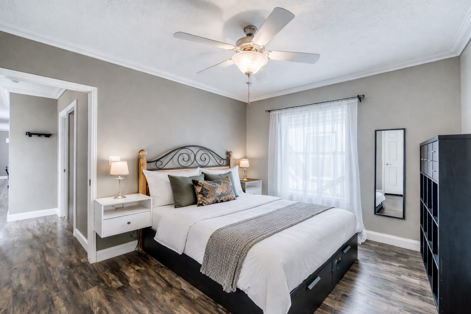 847 Airport Road, Unit 21 Breckenridge, CO 80424 - Photo 5 of 35 a bedroom with a bed and a chandelier