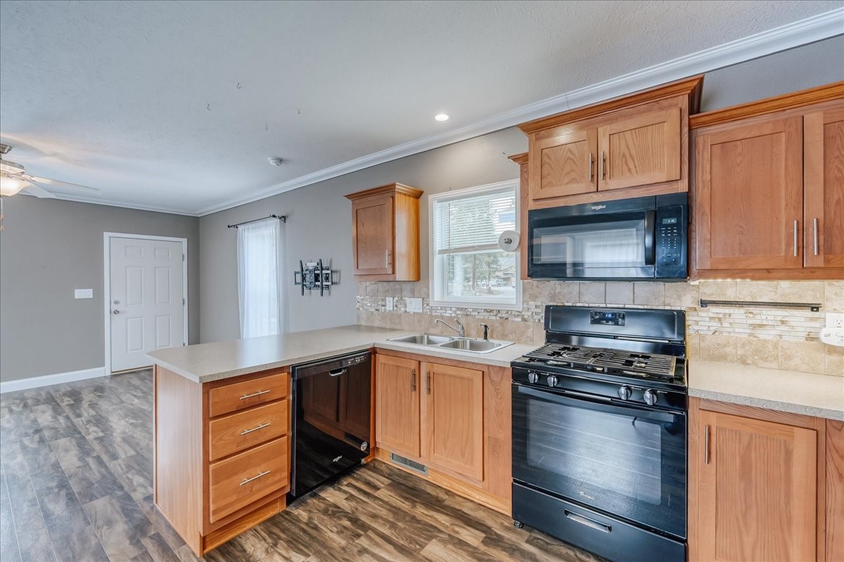 847 Airport Road, Unit 21 Breckenridge, CO 80424 - Photo 10 of 35 a kitchen with a sink stove top oven and cabinets