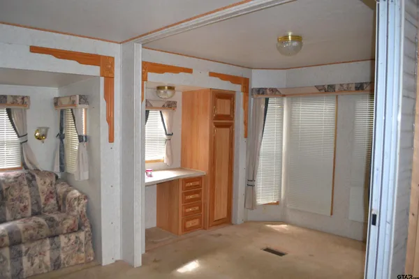 view of livingroom with furniture and window