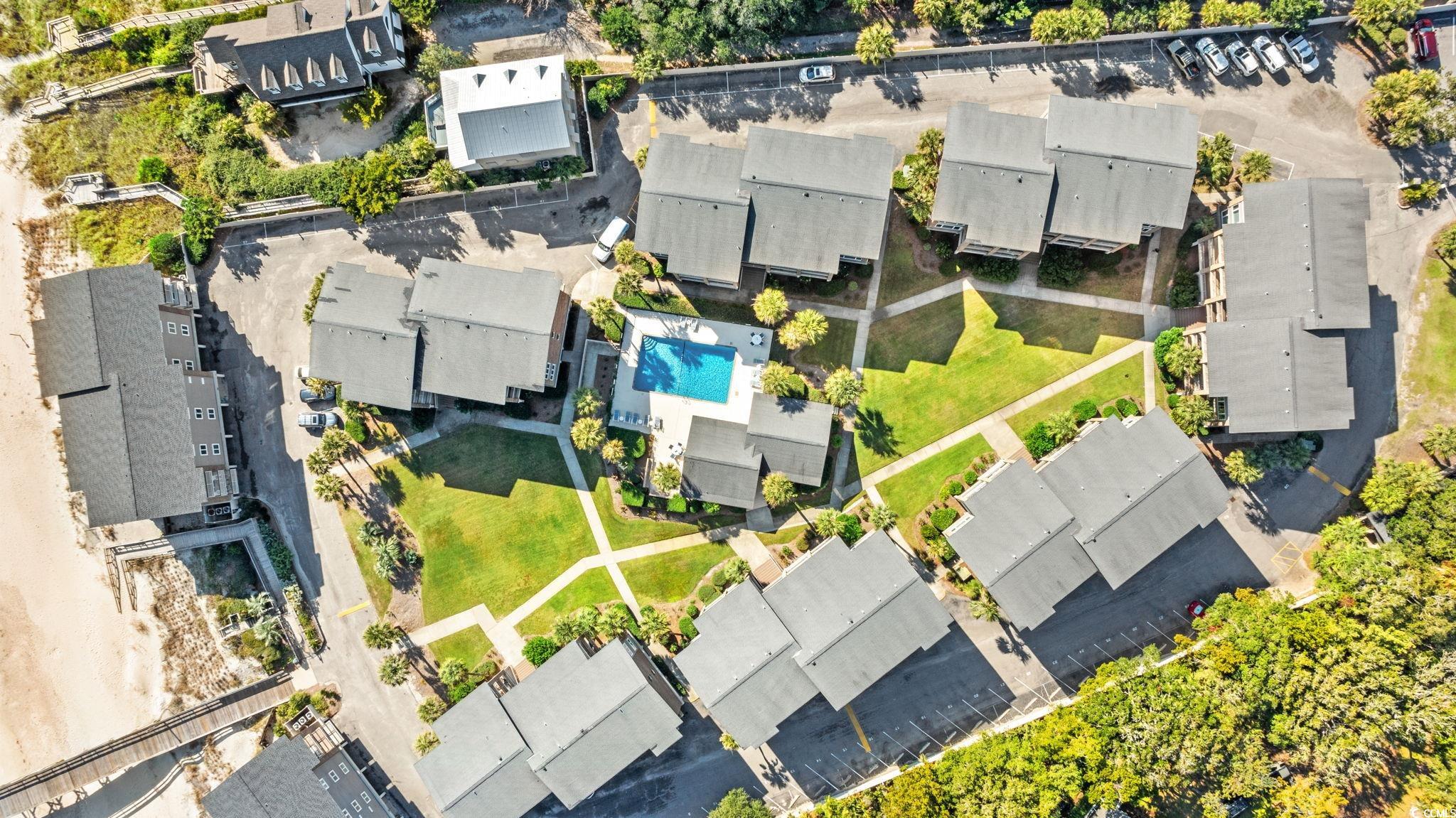 320 Myrtle Avenue Pawleys Island, SC 29585 - Photo 12 of 38 Aerial perspective of suburban area with a pool area