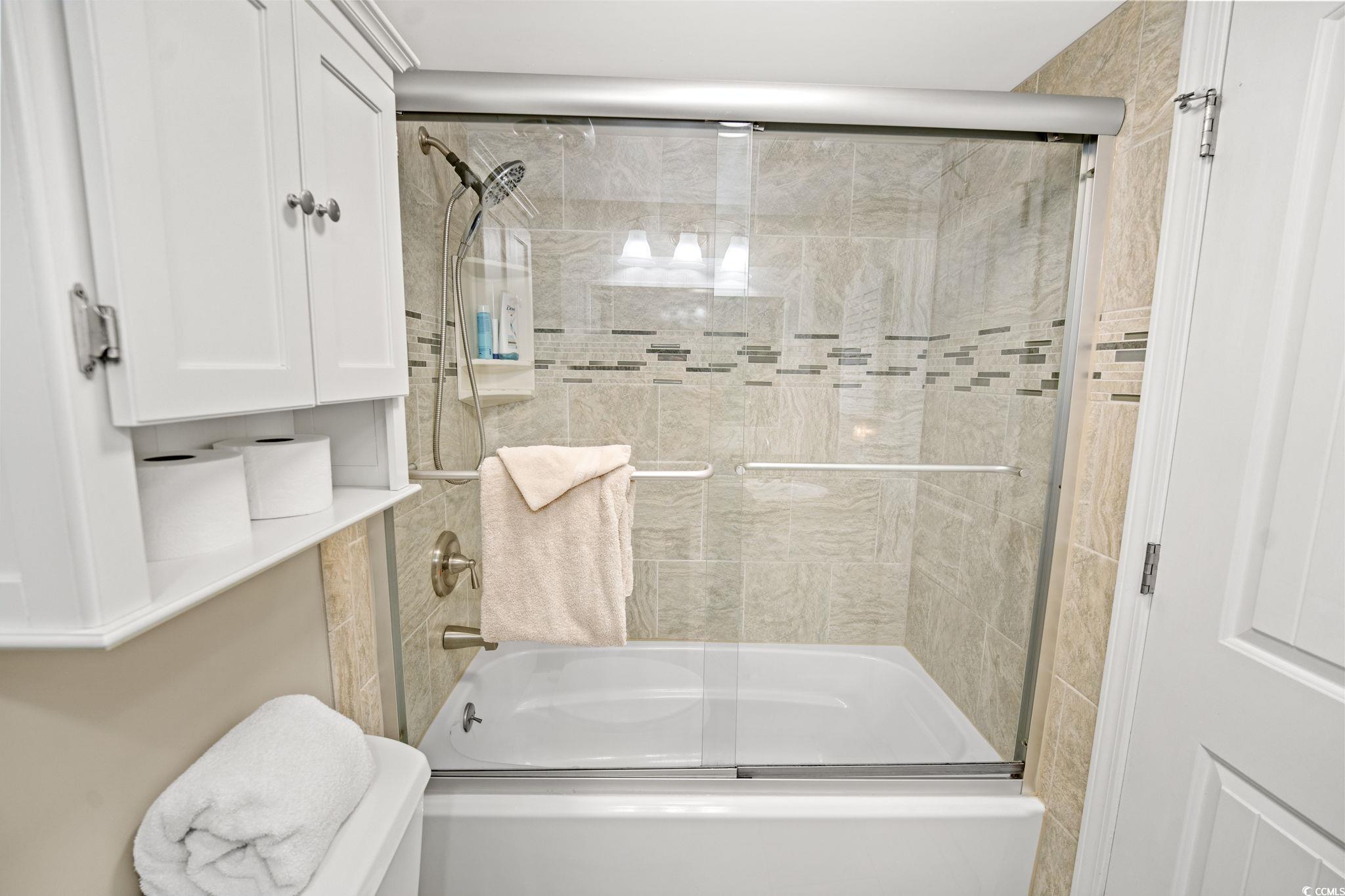 320 Myrtle Avenue Pawleys Island, SC 29585 - Photo 29 of 38 Full bathroom with combined bath / shower with glass door