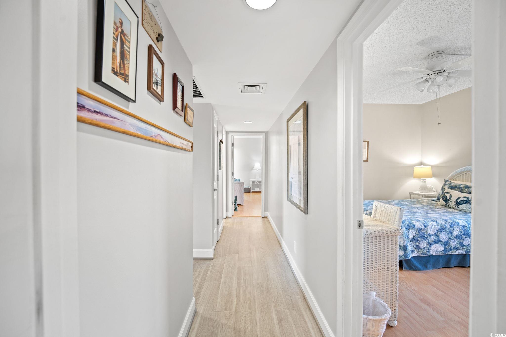 320 Myrtle Avenue Pawleys Island, SC 29585 - Photo 30 of 38 Hall featuring light wood finished floors and recessed lighting